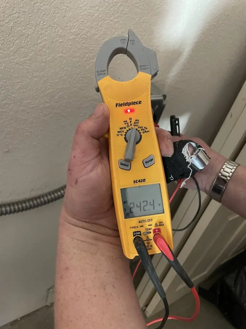 Voltage testing with clamp meter during Generator Installation in St. Marys